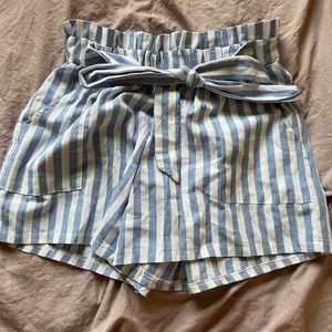 SHEIN high waisted front tie blue and white striped shorts.  Fits size S-M.